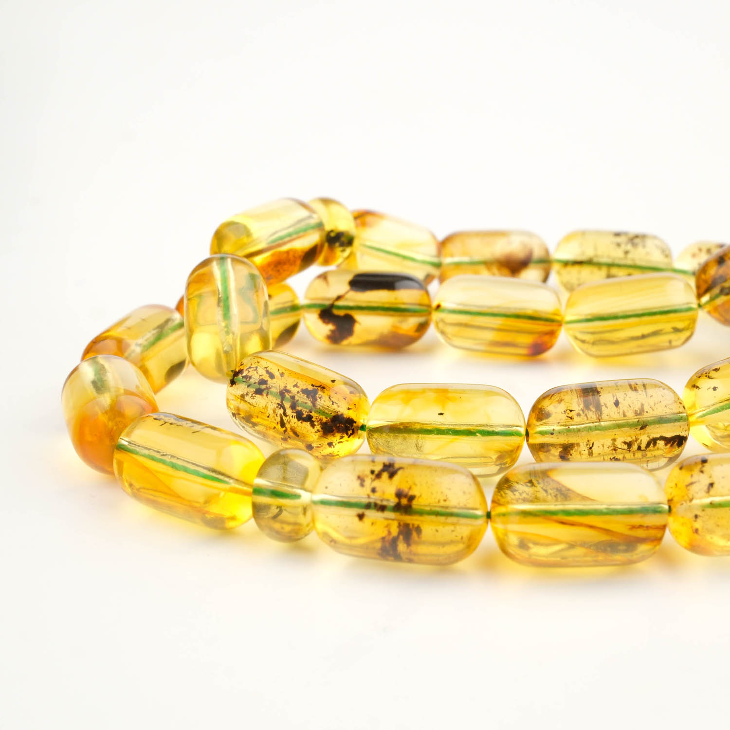 konya-dogaltas-evi-sik-ve-bilge-33luk-kehribar-kapsul-kesim-dogal-tas-gumus-tasarim-tesbih