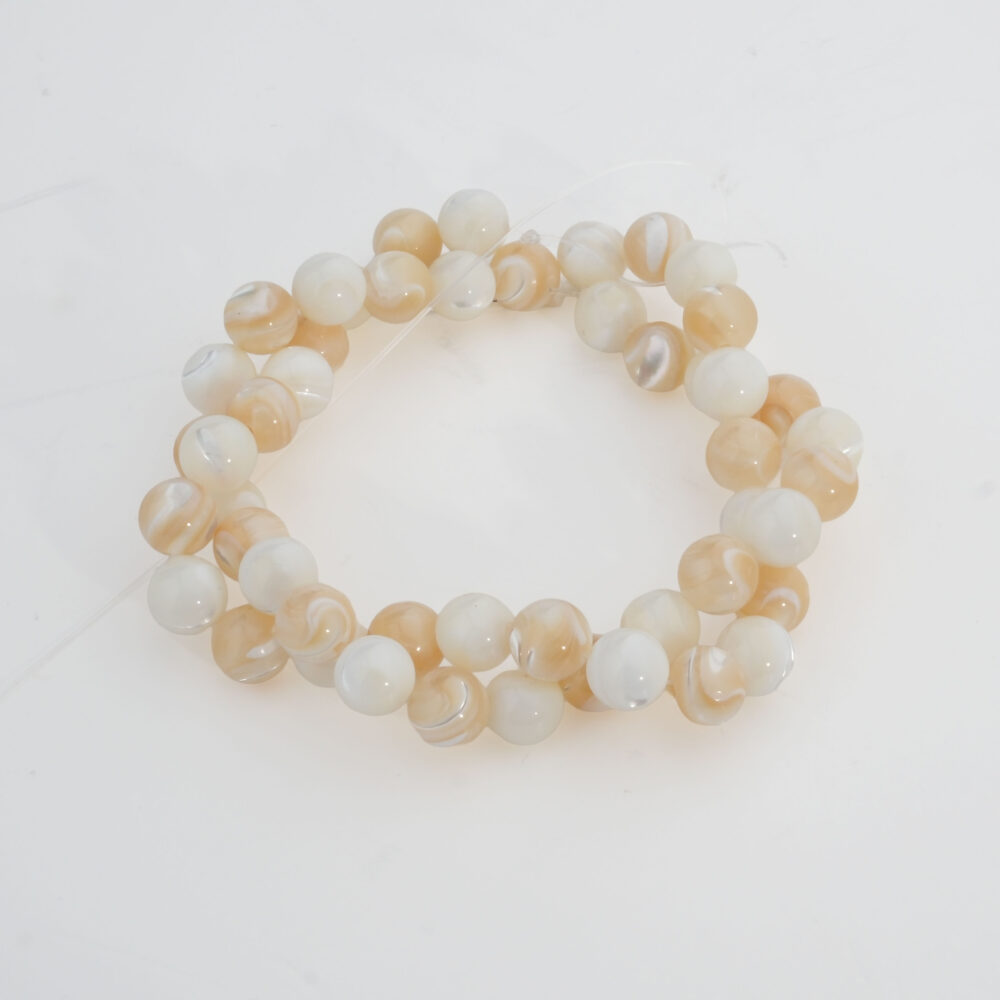 8mm mother of pearl natural stone bead strand in white and brown tones.