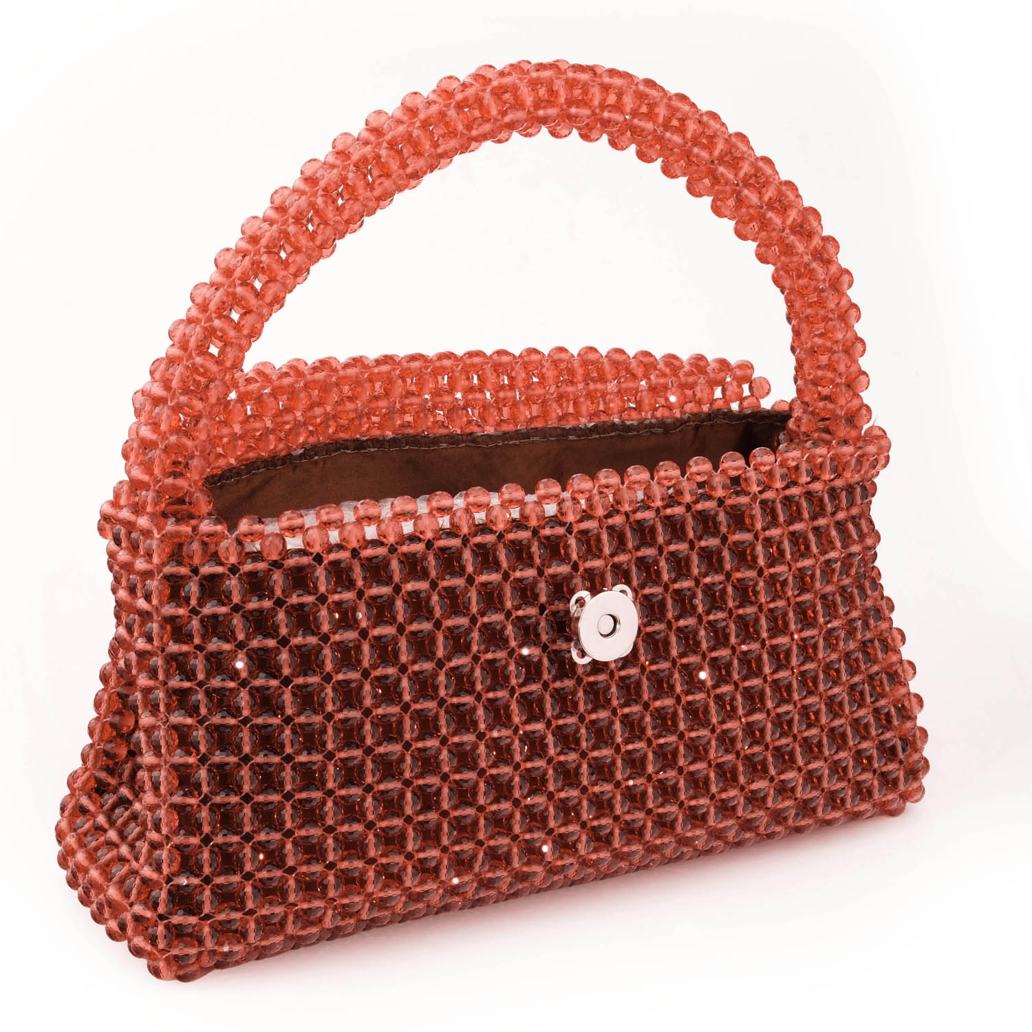 bolso-piedra-natural-zultanita-hecho-a-mano Luxury natural stone bag handcrafted using approximately 2300 pieces of 7mm facet cut zultanite stones that change color according to light.