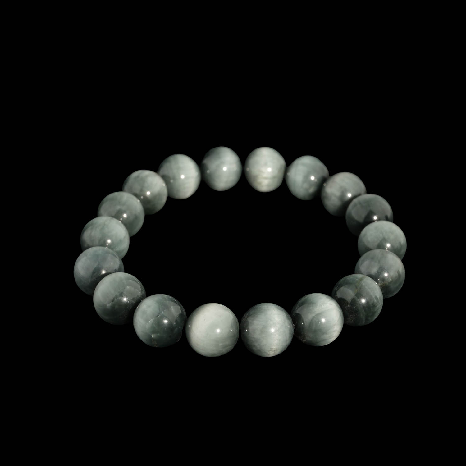 bracciale-pietra-naturale-occhio-di-gatto Bracciale flessibile in pietra naturale realizzato con perle rotonde e lisce di occhio di gatto grigio.