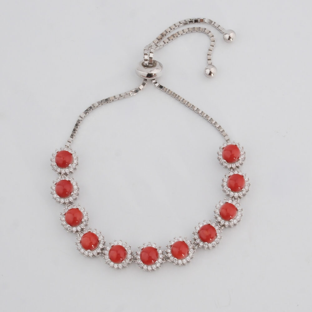 A luxury 925 sterling silver slider bracelet featuring 9 red coral stones enclosed in round cubic zirconia frames, shown in DSCF0676.jpg.