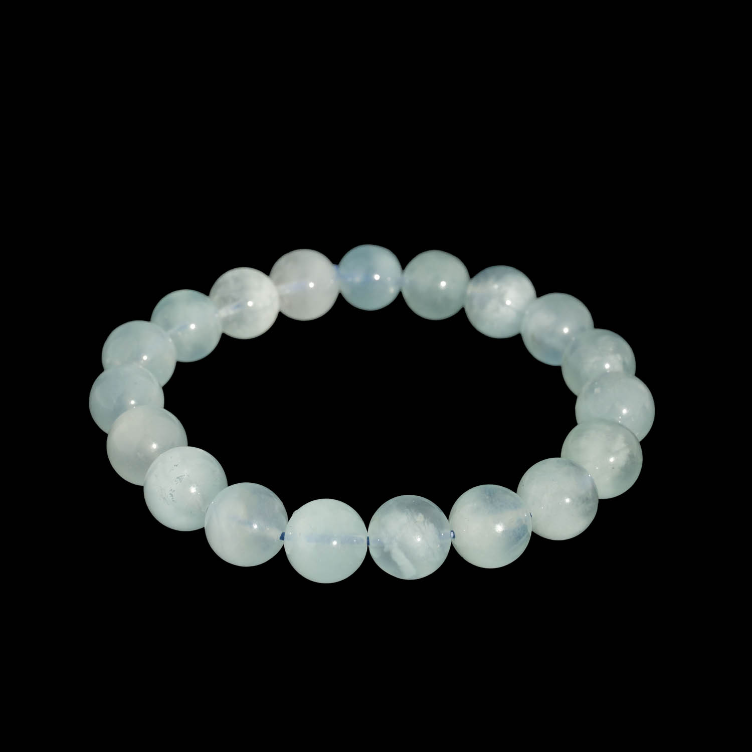 bracelet-pierre-naturelle-aigue-marine-10mm-luxe Flexibles Natursteinarmband aus 10-11mm runden, glatten, halbtransparenten hellblauen Aquamarinperlen.