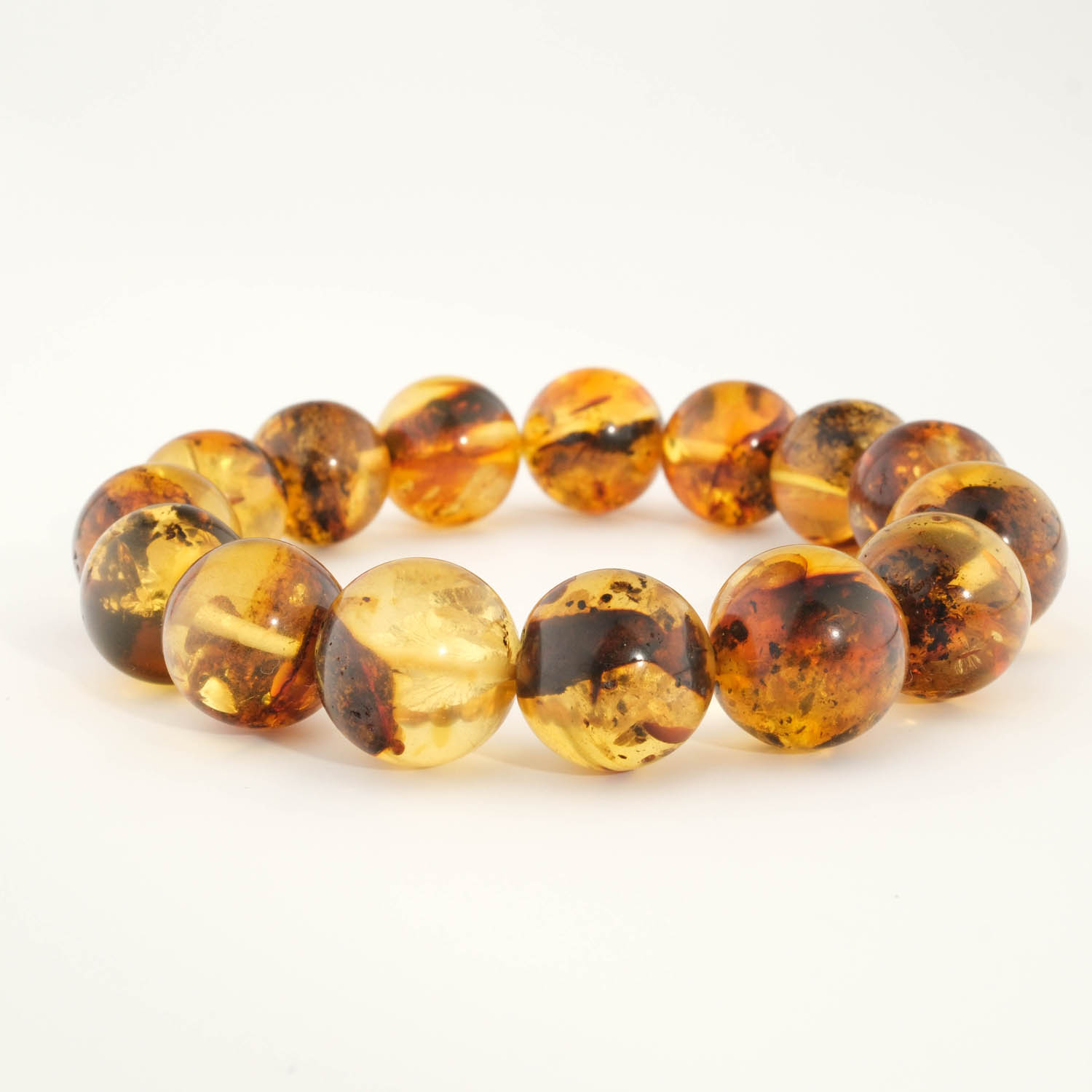 bracelet-ambre-baltique-naturelle-original-rondes Design-Armband aus originalem 13-14mm baltischen Bernstein-Natursteinen im glatten Rundperlen-Schliff für Erwachsene.