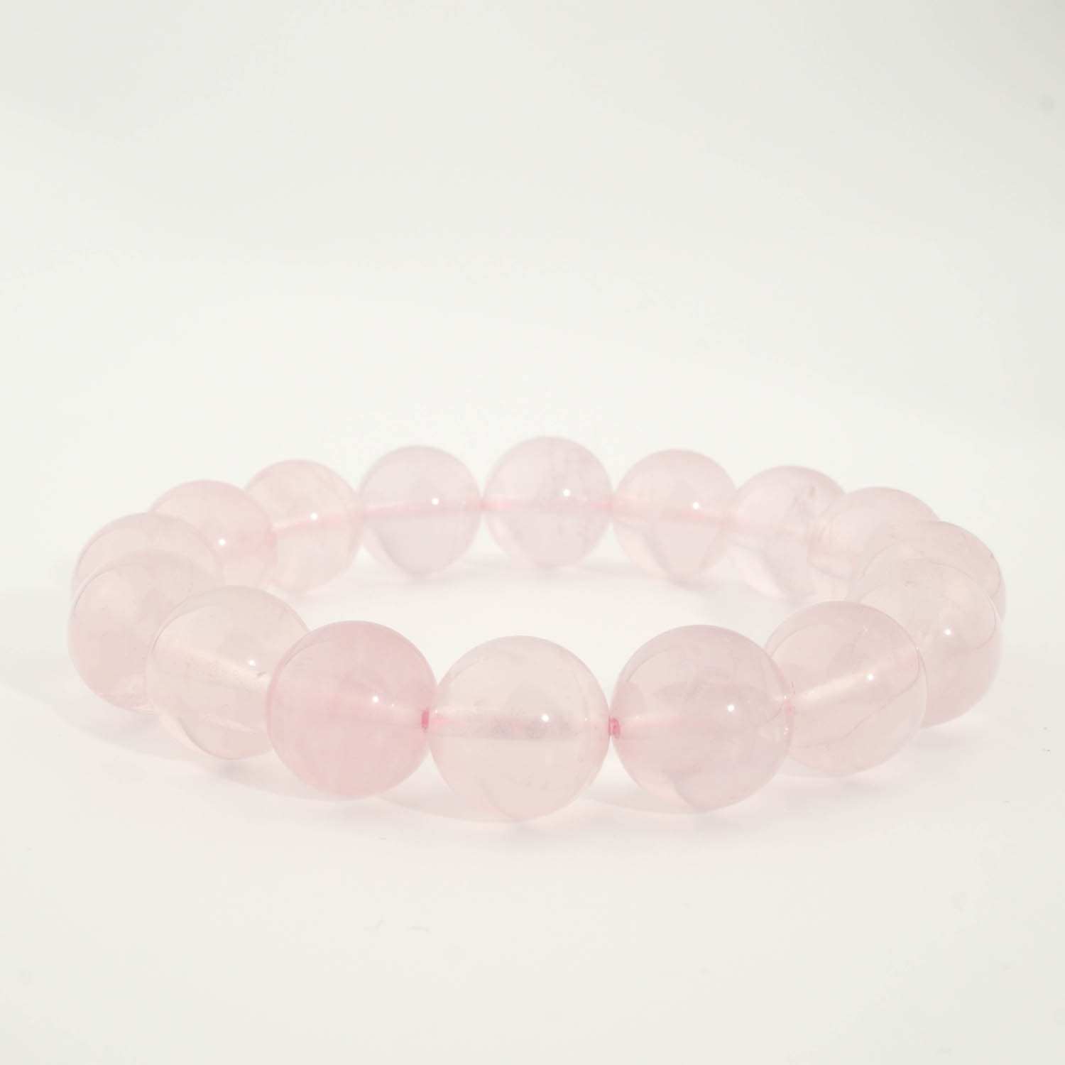 bracelet-pierre-quartz-rose-naturelle-6a-13-14mm-rondes Bracciale di design ornato con sfere da 13-14mm di gemma di quarzo rosa originale 6A+ con sfumature rosa.