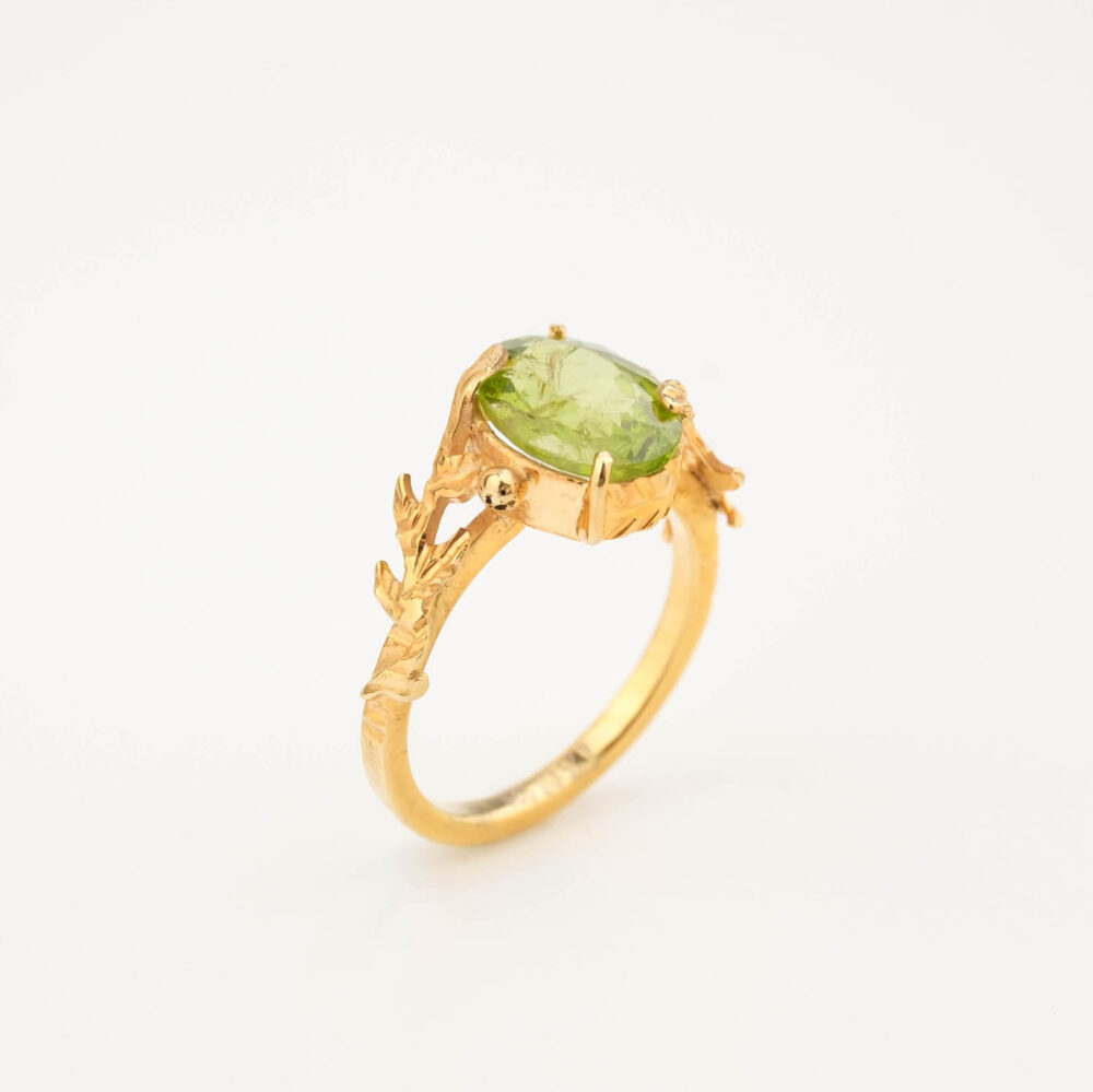 Bague de luxe pour femme en argent sterling 925 plaqué or ornée d'un motif de branche et d'une pierre de péridot naturelle originale.