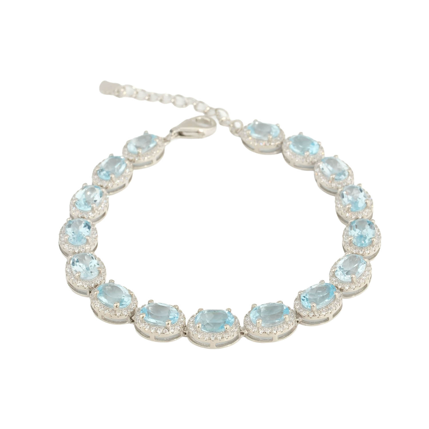 pulsera-diseno-lujo-piedra-topacio-azul-natural-plata-925 Pulsera de diseño de lujo en plata de ley 925, adornada con gemas de topacio azul natural de corte ovalado faceteado.