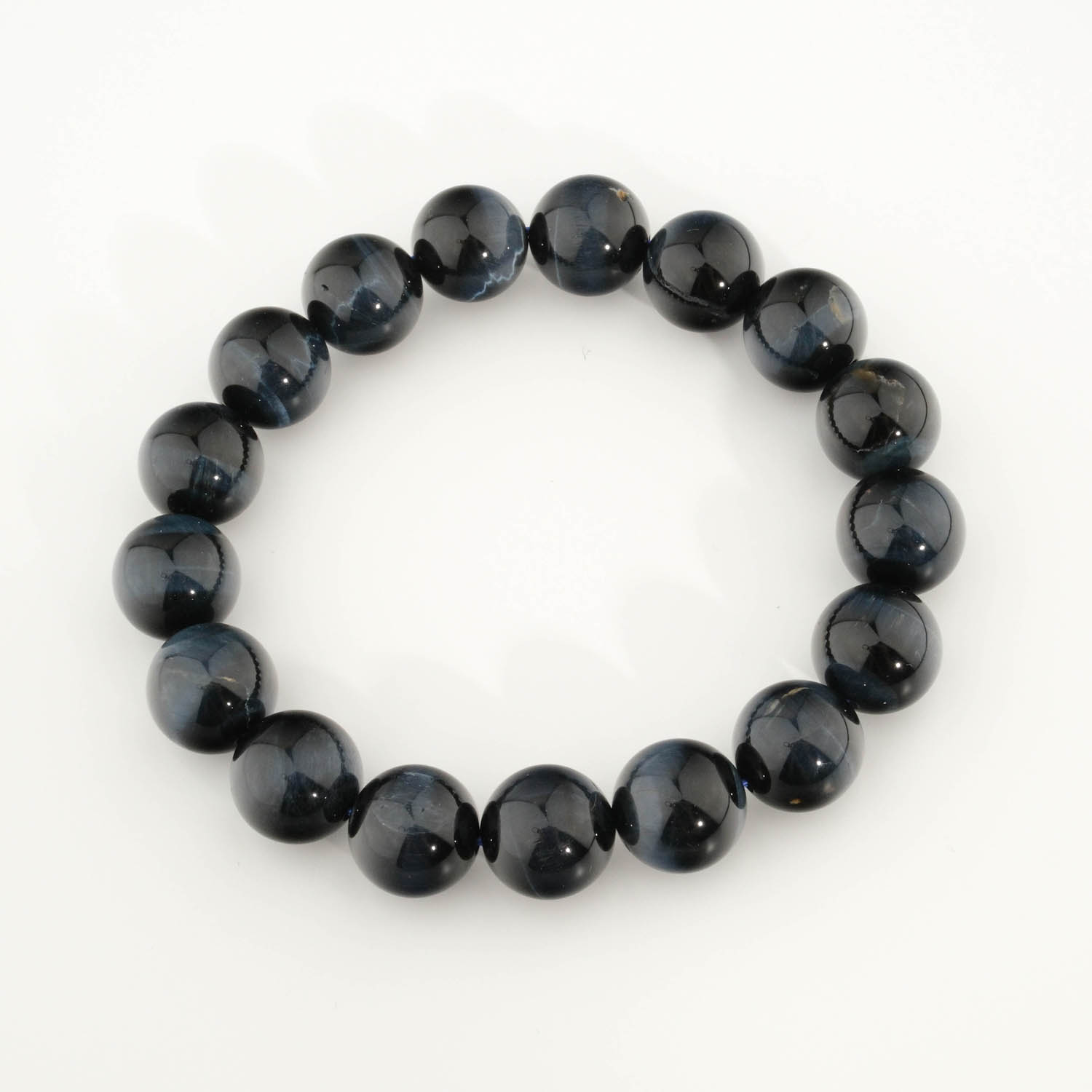 سوار-يد-حجر-عين-النمر-الأزرق-الطبيعي-الأصلي-6A-حجم-كبير-خرز A stylish statement bracelet featuring original 12-13mm 6A+ grade blue tiger's eye round beads with intense chatoyancy.