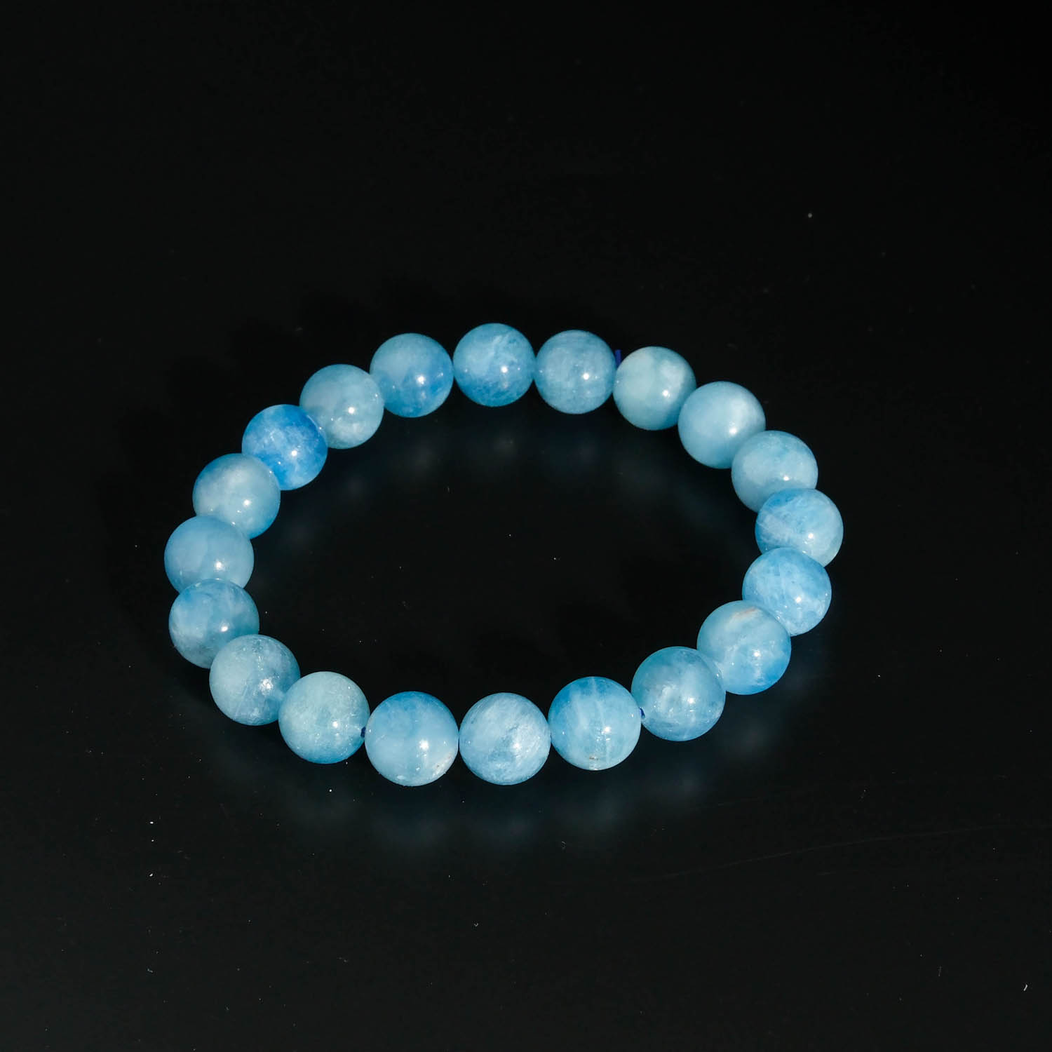 bracelet-homme-femme-aigue-marine-naturelle-6a-9-10mm Bracelet artisanal de perles rondes 9-10mm en aigue-marine naturelle bleu ciel qualité 6A+.