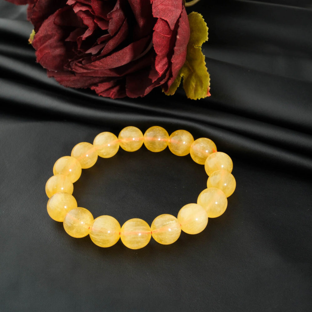 Bracelet artisanal de perles rondes 12-13mm en fluorite jaune doré naturel qualité 6A+.