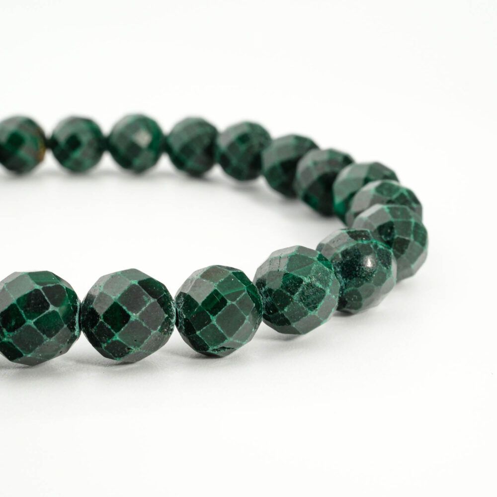 An authentic 8mm natural faceted green banded malachite gemstone beaded stretch bracelet.