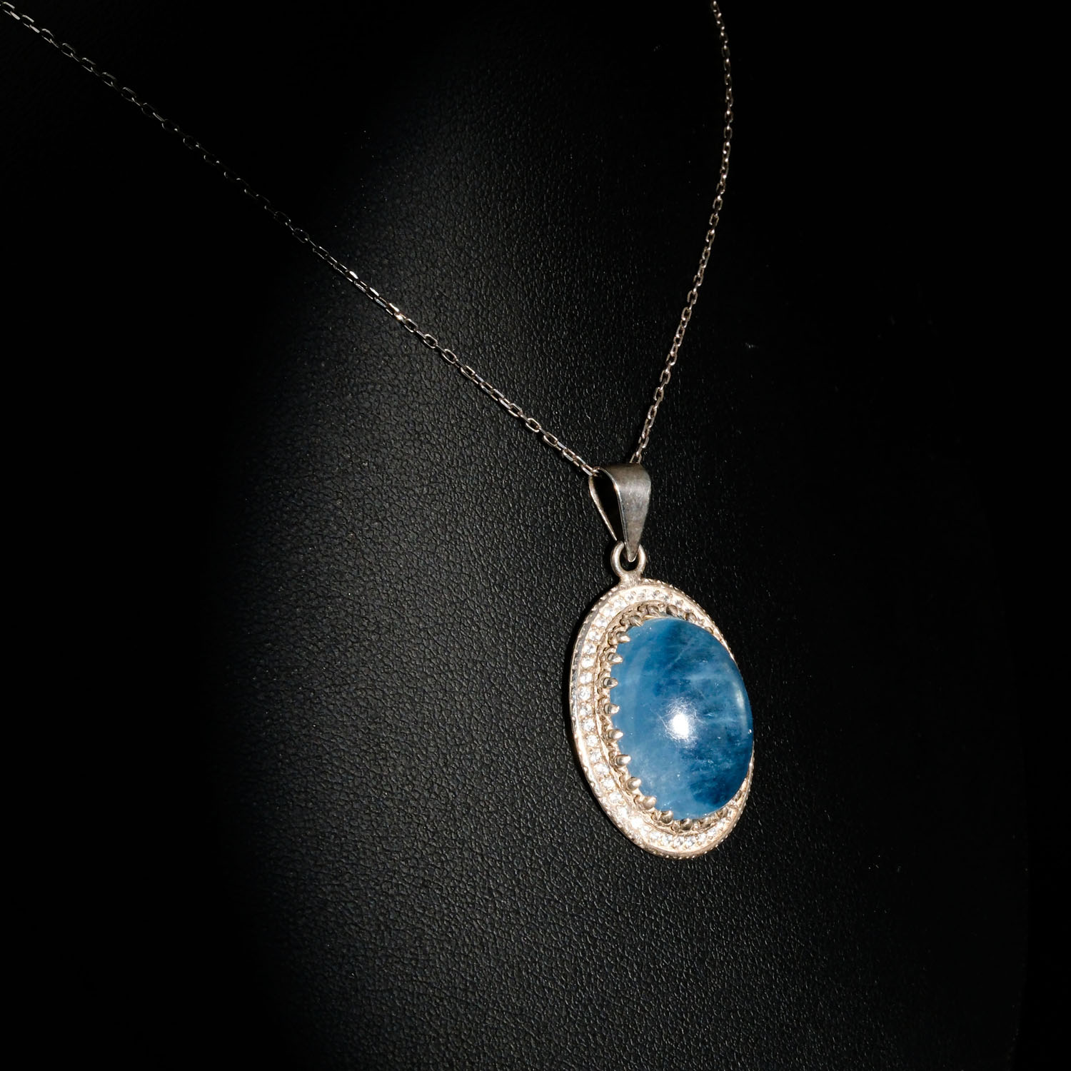 natural-aquamarine-gemstone-oval-cabochon-zircon-halo-925-silver-pendant Genuine natural ocean blue oval cabochon aquamarine gemstone pendant with cubic zirconia halo 925 sterling silver chain necklace.