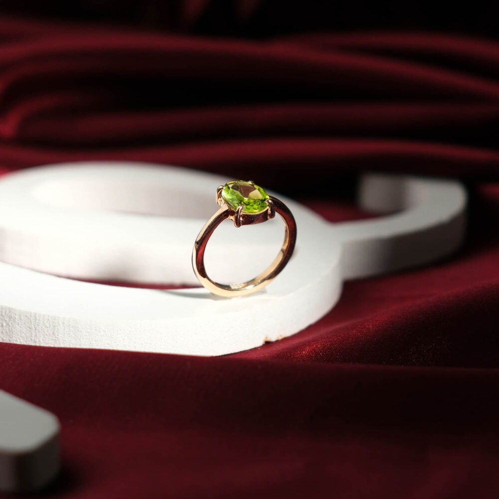 Genuine natural green peridot oval faceted gemstone 925 sterling silver rose gold ring.
