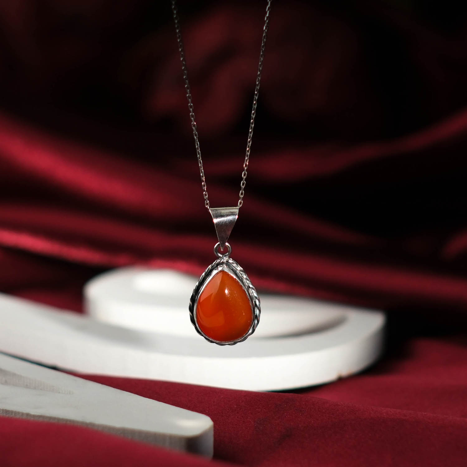 natural-red-carnelian-agate-teardrop-925-sterling-silver-pendant Genuine natural red carnelian agate teardrop cabochon 925 sterling silver rope frame unisex pendant necklace.